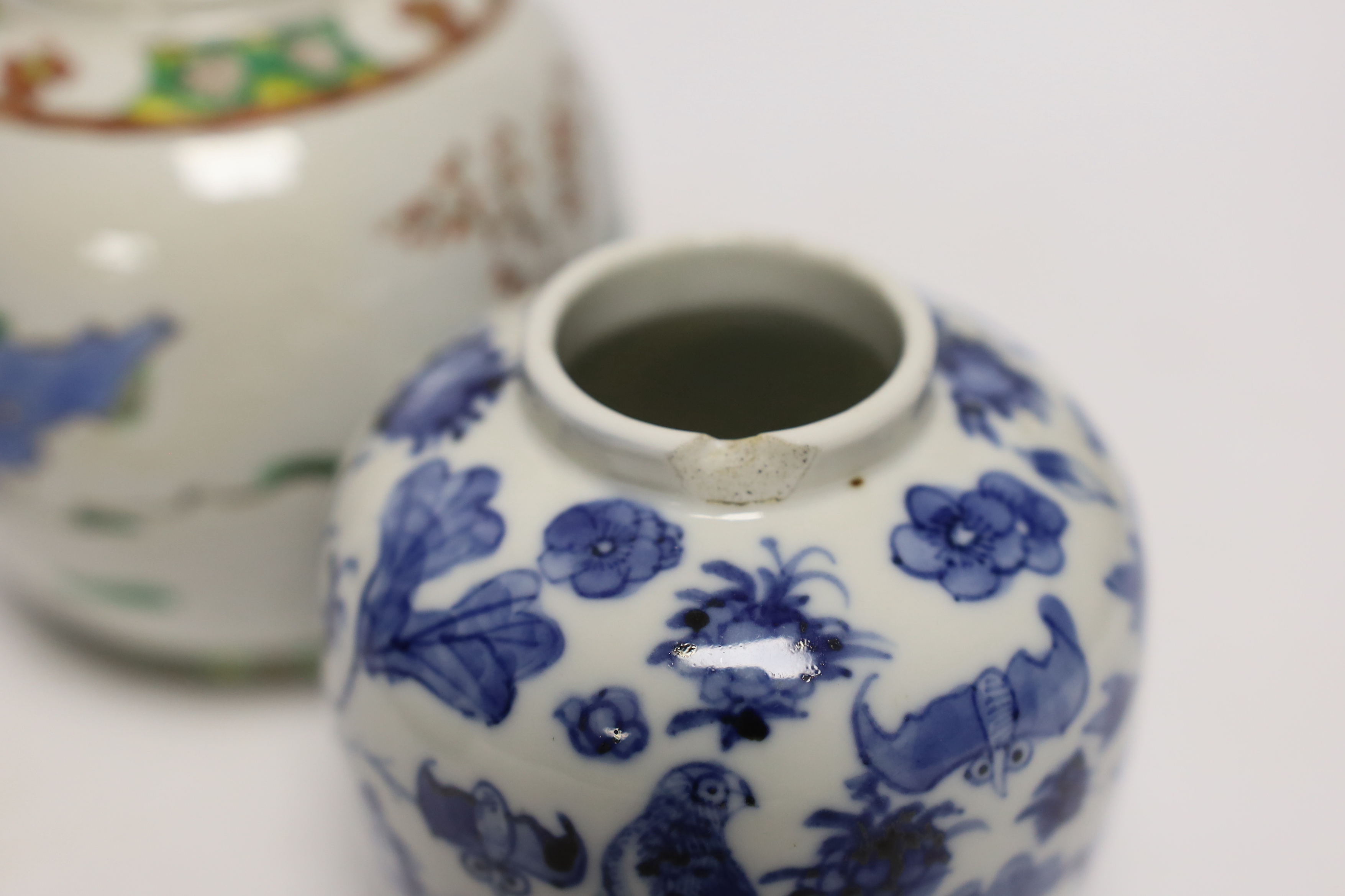 Three Chinese ginger jars, including a blue and white prunus example, Late 19th/early 20th century, largest 13cm high